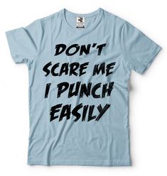 "Halloween Costume T-Shirt Funny Halloween Party Don't Scare Me I Punch Easily Cool Graphic Halloween Tee Shirt This ULTRA COTTON UNISEX T-shirt is made of Pre-shrunk 100% cotton, 6.1-ounce. * Seamless double-needle 7/8\" collar, Double-needle sleeves and hem, Taped neck and shoulders Our T Shirts and Hoodies are Printed by advanced technology Digital Printer on 100% Ultra Cotton tees and hoodies . We use waterbased textile ink, Safest ink type for everyone. Each T shirt is Made individually and Halloween Tee Shirts, Unique Gifts For Dad, Ladies Shirt, Digital Printer, Costume Shirts, T Shirt Costumes, Funny Halloween Costumes, Halloween Trick Or Treat, Halloween Tees