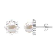 Product Details Add graceful charm to your looks by wearing these Flower Stud Earrings. They speak elegance at every glance, embellished with gorgeous Freshwater Pearl at the center and Round Shape Diamonds adding shine to the floral design. These White Pearl Earrings come with a screw-back closure that keeps them secured in place. Create a statement wherever you go while wearing these Freshwater Pearl Earrings. Product Information SKU SHP-EARRINGS082210279 Weight 1.52 gm (Approximate) FRESHWATE White Pearl Earring, Freshwater Pearls Earrings, Flower Stud, Pearl Flower, Flower Earrings Studs, Flower Studs, White Pearl, Pearl White, Round Shape