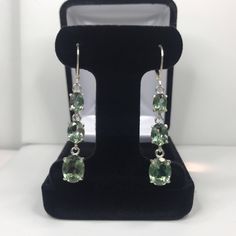 "Beautiful Green Spinel \"Tourmaline\" Leverback Earrings * Oval Cut Green Spinel \"Tourmaline\" measure 10x8mm, 8x6mm and 7x5mm each * 9.8cts total Gemstone weight * Leverback Fastening * Each measure 2 inches Long * Solid Sterling Silver Hallmarked & Gift Ready! Matching Pendant, Ring & Bracelet also Available! These Spinels are laboratory grown stones. They are identical to the genuine stone in every way, including chemistry, composition and hardness, with an outstanding cut, clarity Fine Jewelry Tourmaline Earrings For Formal Occasions, Tourmaline Earrings For Formal Occasions, Elegant Tourmaline Earrings For Formal Occasions, Formal Hallmarked Tourmaline Jewelry, Tourmaline Gemstone Earrings In Fine Jewelry Style, Elegant Green Amethyst Earrings For Formal Occasions, Elegant Tourmaline Jewelry With Accent Stones, Formal Tourmaline Drop Earrings, Elegant Tourmaline Earrings With Gemstone Accents