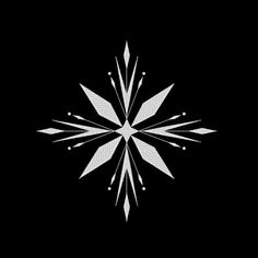 a white snowflake on a black background in the middle of the image is an arrow