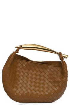 The brand's iconic intrecciato weave, handwoven from strips of lambskin, textures this softly structured hobo bag topped with a sculptural metallic handle. Magnetic closure Top carry handle Unlined Leather Made in Italy Designer Handbags Designer Brown Hobo Bag For Evening, Designer Bags With Interwoven Design For Shopping, Designer Hobo Bag With Round Handle, Elegant Brown Hobo Bag With Woven Leather, Brown Hobo Bag With Braided Handles For Evening, Chic Brown Shoulder Bag With Interwoven Design, Luxury Hobo Bag With Interwoven Design For Everyday Use, Designer Brown Hobo Bag With Top Handle, Chic Formal Hobo Bag With Intrecciato Weave