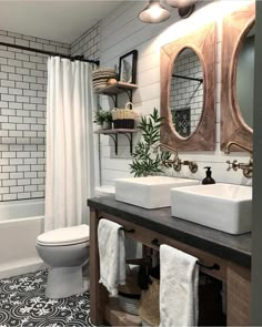 the bathroom is decorated in black and white