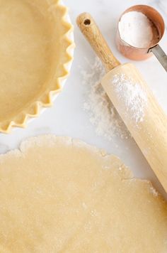 flaky pie crust on a white counter top