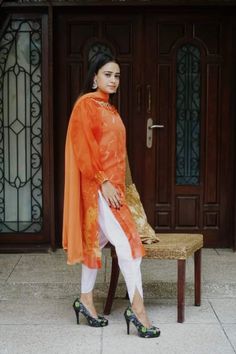 Tulip Shalwar Kameez, Color orange + White. A short light volume stuff. 3D flowers and Organza sleeves. Designer Orange Salwar Kameez, Spring Orange Straight Kurta, Orange Sets With Resham Embroidery For Spring, Orange Resham Embroidery Sets For Spring, Orange Floral Embroidered Sets, Spring Orange Sets With Resham Embroidery, Spring Orange Resham Embroidery Sets, Orange Georgette Kurta With Dupatta, Orange Straight Kurta Dress With Dupatta