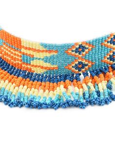 Blue and orange choker necklace Material and stone type: alloy with artificial beads Closure: lobster closure Care Instructions: Wipe your jewellery with a soft cloth after every use Always store your jewellery in a flat box to avoid accidental scratches Keep sprays and perfumes away from your jewellery Do not soak your jewellery in water Dispatch within 7 days Orange Choker, Ethnic Kurti, Indian Choker, Anarkali Lehenga, Wedding Jumpsuit, Ready To Wear Saree, Blue And Orange, Dress Jewelry, Wedding Wear