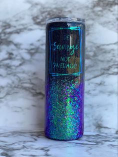 a purple and blue glitter tumbler with the words, i am enough to not have feelings