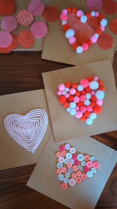 paper bags with hearts and buttons on them