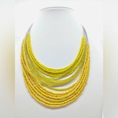 Yellow Beaded Multilayered Silver Necklace Yellow Multi-strand Polished Beads Jewelry, Yellow Multi-strand Jewelry With Polished Beads, Yellow Multi-strand Polished Beaded Necklaces, Yellow Beaded Chain Necklace For Party, Yellow Necklaces With Faceted Beads, Yellow Necklace With Faceted Beads, Adjustable Multi-strand Layered Beaded Necklace, Yellow Multi-strand Beaded Chain Necklace, Yellow Double Strand Beaded Necklace