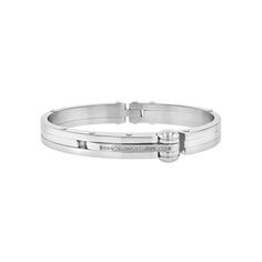 Always pick a jewelry piece that inspires confidence. Consider this mens diamond and stainless steel cuff bracelet. This structured mens piece is polished to a high gleam and features 20 round diamonds on a single row. A hinged clasp secures the bracelet to your wrist so you never have to worry losing it. Stainless steel is tarnish-resistant and hypoallergenic. With proper care, this durable bracelet will last years on your mens jewelry collection. This piece is an ideal gift for men for any occ Hinge Bracelet, Men Bracelet, Expensive Jewelry, Hinged Bracelet, Gemstone Bracelets, Gift For Men, Buy 1, Hinges, Cuff Bracelet