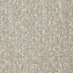 an upholstered fabric textured with white and beige colors, suitable to use as a background or wallpaper