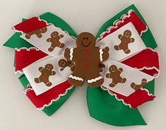 "RUN! RUN! AS FAST AS YOU CAN...I'M THE GINGERBREAD MAN BOW **The size of the pictured bow is 4.5 inches, but can be ordered in other sizes with the same shipping time. Hair bows may be made with a french barrette, an alligator clip (as shown), or a nylon baby head band. (If there's not an option for the band, please leave me a note.) ITEM DETAILS: *Ribbon Type: Base Layer- kelly green Middle Layer-  red & white moon stitch ribbon                    Top Layer-gingerbread print Embellished with a Gingerbread Hair Bow, Gingerbread Hair, Baby Band, Holiday Hair Bows, Ribbon Top, The Gingerbread Man, Holiday Hair, White Moon, Bow Christmas