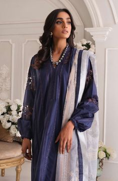 Embroidered Blue Salwar Kameez Pakistani Eid Dress is a charismatic masterpiece to have an elegant appearance. Beautiful work of embroidery and digital print makes this stunning Kameez Trouser in premium Lawn fabric an epitome of beauty and elegance. Kameez: Embroidered kameez in beautiful blue shade comes in premium Lawn fabric. This stunning Lawn Kameez is adorned with lavish designs and fine details. Lace work around the borders of this kameez give it a perfect finishing. Salwar: The embroide Blue Salwar Kameez, Salwar Kameez Pakistani, Embroidered Salwar, Eid Dress, Fuchsia Wedding, Latest Dress Design, Dress Salwar Kameez, Eid Dresses, Lawn Fabric