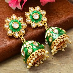 Fancy Party Wear Traditional Earrings. Perfect with ethnic & traditional wear. Perfect gift for any occasion for yourself and your dear ones. It is advisable to store jewellery in a zip lock pouch (air tight pouch), keep away from water perfume and other chemicals and clean it with dry and soft cloth. Heavy Anarkali For Diwali, Heavy Anarkali Traditional Wear For Diwali, Traditional Green Danglers For Celebration, Temple Style Bridal Meenakari Earrings For Festivals, Green Cutdana Chandbalis For Diwali, Bollywood Style Green Bridal Earrings For Festive Occasion, Green Bollywood Bridal Earrings For Festive Occasions, Green Bridal Earrings With Latkans For Festivals, Temple Jewelry Bridal Meenakari Earrings For Festivals