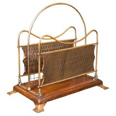 an antique bed frame with metal and wood details on the sides, set against a white background