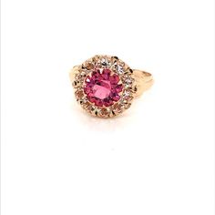 Vintage 1940's 10k yellow gold pink stone ring. The center stone is the color of a gorgeous pink sapphire. The size of the ring is a 5.75, and has the ability to be resized. Classic Pink Cluster Ring For Formal Occasions, Classic Pink Cluster Ring With Center Stone, Classic Pink Cluster Ring With Halo Setting, Pink Cluster Ring For Formal Occasions, Classic Pink Cluster Ring With Prong Setting, Classic Pink Cluster Ring For Anniversary, Pink Formal Cluster Ring With Prong Setting, Pink Oval Cluster Ring With Center Stone, Classic Pink Ruby Ring With Halo Setting