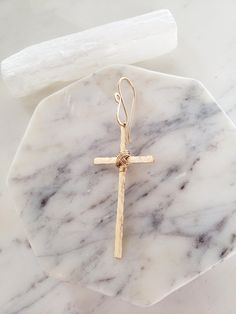 This dramatic and stunning cross is hand cut, hammered and polished for a shimmery glimmery textured effect. ✨ Made from 14k Gold fill or 925 Sterling Silver. Gold fill is of much higher quality than gold plate and gives the look of solid gold for a fraction of the price. Hypoallergenic, lead and nickel free. Excellent for sensitive ears! Hand wrapped and finished with a dramatic oversized ear wire. Sold as a single or a pair. Comes thoughtfully packaged, ready to be given as a gift or treasured Gold Ear Ring, Simple Necklace Designs, Cross Earring, Gothic Cross, Gothic Crosses, Ear Ring, Earring Gold, Hammered Gold, Earrings Large