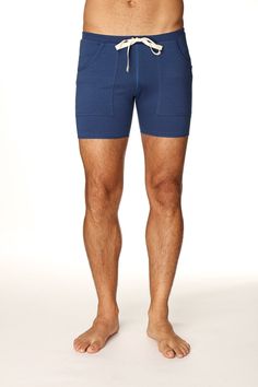 These light-weight Modal (Birch Tree) Mens Transition Yoga Shorts are a "hybrid" short merging the distance between our two most popular shorts -- the Fusion Short and the Eco-Track Short. These French-Terry mid-thigh shorts are meant to be form-fitting yet still provide the convenience of front pockets that are sewn on TOP of the garment so they do not bunch up inside the short, nor float about. There is 1" of 2x1 RIB piping that extends from the sides up & above the rear-end -- providing stabi Navy Functional Shorts, Blue Activewear With Pockets And Short Legs, Navy Go-dry Short Length Bottoms, Navy Training Bottoms Short Length, Blue Boxer Briefs With Built-in Shorts For Sports, Functional Blue Shorts For Yoga, Navy Gym Bottoms With Built-in Shorts, Functional Loungewear Shorts With Built-in Shorts, Blue Short Length Boxer Briefs For Gym