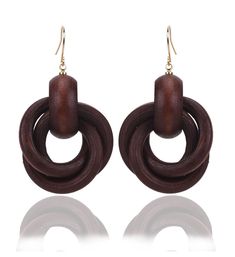 PRICES MAY VARY. Dangle earrings material: Wood + Alloy. Beautiful in a fashion look. Handmade Diy. Hoop earrings size: 5.5*3.2 cm. Net Weight: 10g. Design is elegant and looks very charming. Lightweight comfortable to wear. Perfect gift to your loved ones, like lover, girlfriend, wife, fiancee, daughter, your female friends, or even yourself for valentine's day, birthday, Christmas day, and so on. These earrings jewelry can show the beauty and personality of women.Its not only summer jewelry an Afrocentric Earrings, Wood Jewelry, Cross Ring, Wooden Earrings, Dangling Earrings, Wood Earrings, Earrings Vintage, Online Earrings, Wood Jewellery