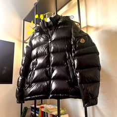 Classic Moncler Puffer Jacket With Removable Hoodie And Zipper Pockets To Keep Belongings Safe. Fashionable & Warm For The Winter & It’s Perfect For Anyone In The Cold. It’s In Perfect Conditions, Very Well Kept Piece. It’s A Size 5. I Can Fit A Male Or Female That’s S/M Or Even Can Fit Someone That’s M/L Luxury Down Outerwear With Pockets, Luxury Long Sleeve Puffer Jacket For Outdoor, Luxury Long Sleeve Outdoor Outerwear, Luxury Long Sleeve Down Outerwear, Luxury Down Long Sleeve Outerwear, Luxury Puffer Jacket For Cold Weather, Designer Puffer Outerwear For Outdoor, Designer Down Puffer Jacket, Designer Puffer Outdoor Outerwear