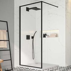 a bathroom with a walk in shower next to a black and white checkered floor