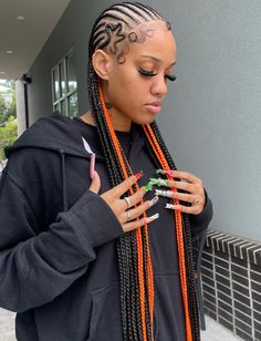 Cornrows and Orange Peek-a-Boo Braids Peek A Boo Cornrows, Peekaboo Braids Orange, Peekaboo Cornrow Braids, Peekaboo Cornrows, Black And Orange Braids, Peekaboo Fulani Braids, Peek A Boo Braids, Peek A Boo Box Braids, Box Braids Medium Length