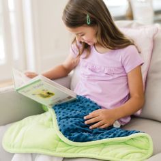 Encourage increased concentration and performance at school, work or home with this weighted lap pad. Featuring bright colors and both smooth and textured surfaces, thisproduct offers sensory satisfaction as the gentle pressure helps users relax and focus on the task at hand.o Plush, high-quality fabric with textured and smooth surfaces for added sensory inputo Weighted at 5 lbs., the ideal weight for children ages 5 and upo Sized at 24"x19.5" for use at home or on the goo Hand wash in cold waterAge Recommendation: Ages 5 and up Kids Writing Activities, Weighted Lap Pad, Family Roles, Sensory Input, Gifted Education, Ideal Weight, Quote Cards, School Age, Stem Toys