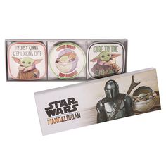 three star wars themed coasters are shown in their packaging boxes, one with an image of the child yoda