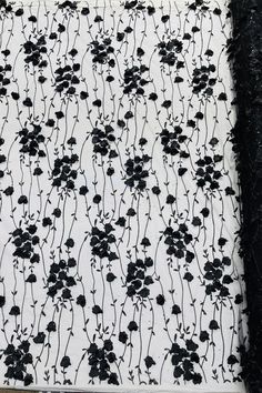 black and white fabric with flowers on it