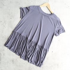 peplum crewneck tee shirt - more colors – shophearts Summer Relaxed Fit T-shirt With Ruffles, Fall Cotton T-shirt With Ruffles, Casual Short Sleeve Top With Ruffle Hem, Solid Color Crew Neck Top With Ruffles, Casual Cotton Peplum Top, Casual Ruffled T-shirt For Fall, Fitted Flutter Sleeve Top For Summer, Purple Flutter Sleeve Top For Summer, Cotton Tops With Ruffle Hem In Solid Color