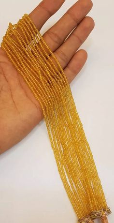 Sri Lankan Natural Yello Sapphire Beads Strand Necklace Natural 100% Yellow Sapphires the Necklace can be adjustable Size of beads 2mm to 3mm Length 42cm to 45cm Stone Natural Yellow Sapphires Elegant Yellow Beaded Necklaces With Tiny Beads, Yellow Jewelry With Tiny Round Beads, Yellow Tiny Beads Round Jewelry, Yellow Round Beaded Jewelry, Yellow Jewelry With Faceted Round Beads, Elegant Yellow Polished Beads, Yellow Faceted Beads Round Necklace, Yellow Gemstone Beaded Necklaces, Yellow Faceted Beads Necklace