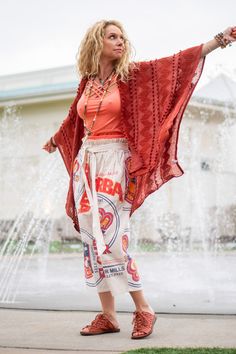 The Indie Kimono in Rust Our Indie Kimono is a perfect staple for any on-trend bohemian style outfit! Pair with any dress, top, pants, or skirt, along with some pieces of beautiful bohemian style jewelry! Our Indie Kimono is made of 100% acrylic fabric and features a total length of 38", and also can be machine-washed in cold water. For reference the model, and owner Spirit, is wearing the one size. Her height is 5'6 Weight is 124 Summer Festival Bottoms With Boho Print, Summer Festival Boho Print Bottoms, Summer Festival Boho Bottoms, Bohemian Boho Print Bottoms For Beach Season, Bohemian Fall Festival Bottoms, Bohemian Summer Festival Bottoms, Red Bohemian Bottoms For Vacation, Bohemian Red Bottoms For Vacation, Bohemian Rayon Bottoms For Fall