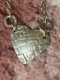 Textured heart necklace made from fine silver (.999) on a sterling rollo chain.  Length of necklace is 16 inches. Dichroic Pendant, Spoon Bracelet, Mermaid Necklace, Bib Necklace, Fine Silver, Chain Length, Heart Necklace, Pendant Necklaces, Jewelry Necklace Pendant