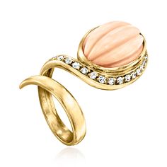 Ross-Simons - C. 1980 Vintage Pink Coral, .30ct t. w. Diamond Cocktail Ring Size 5. C. 1980. Fall in love with this fanciful, feminine cocktail ring from our Estate collection! Featuring a smooth 18x12mm pink coral oval centerpiece, neatly carved with a lined pattern, and sparkling outer border of .30 ct. t. w. round brilliant-cut diamonds, the ring makes a bright statement that is impossible to forget. Crafted in 18kt yellow gold. 1 1/4" wide. Diamond and pink coral cocktail ring. Exclusive, one-of-a-kind Estate Jewelry. Coral Rings For Women Gold, Vintage Oval Coral Jewelry, Luxury Coral Gemstone Ring, 1960s Cocktail Rings, Vintage Cocktail Ring, Coral And Gold, Diamond Cocktail Rings, Jewelry Business, Round Brilliant Cut Diamond