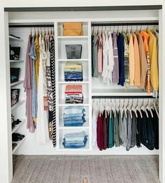 an organized closet with clothes and shoes