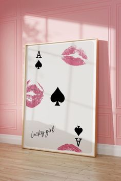 a card with lipstick on it and the words lucky girl written in front of it