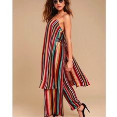 The Free People Ruby Multi Striped Two-Piece Set Was Made For Dreamers And Magic Makers! Vibrant Multicolored Stripes Decorates This Woven Two-Piece Jumpsuit That Includes A Maxi Top, With Skinny Straps And Side Slits, And Matching Wide Leg Pants With An Elasticized, Drawstring Waist. Unlined. 100% Viscose. Nwot Summer Multicolor Jumpsuit For Brunch, Multicolor Jumpsuits And Rompers For Summer Loungewear, Striped Two Piece, Pakistani Fashion Casual, Spring Clothing, Two Piece Jumpsuit, Maxi Tops, People Clothes, Pant Suits