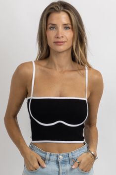 Chic Black Bra-friendly Tops, Black Seamless Tank Top For Party, Black Cami Top With Built-in Bra, Black Stretch Crop Top With Adjustable Straps, Black Party Top With Adjustable Straps, Black Ribbed Tops For Party, Black Sleeveless Nylon Tops, Black Nylon Tops With Tank Straps, Trendy Black Crop Top With Straps