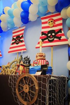 a pirate themed party with balloons and decorations