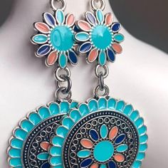 Silver Metal With Pretty Enameled Colors In Turquoise, Navy Blue And Orange. The Colors Really Pop! Great Summertime Earrings. Top Piece Is A Flower Shape Which Measures 1/2" Diameter. Attached To This Is A Round Piece Which Measures 1" Diameter. * French Wire Hooks W/ Clear Rubber Stoppers * Earrings Dangle Down Approx. 2 3/8" * Lightweight * Brand New Questions And Offers Always Welcome - Thank You! Orange Daisy, Flower Dangle Earrings, French Wire, Blue And Orange, Earrings Dangle, Daisy Flower, Flower Shape, Turquoise Blue, Blue Orange