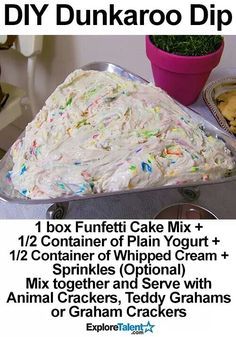 a cake with white frosting and sprinkles on it in a pan