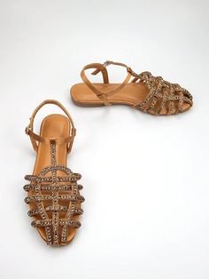 Elevate your style with our Gorgeous Rhinestone Sandals. Made with light brown sardine fabric and featuring a braided ankle strap, these flats are perfect for both daily wear and parties. The sparkling rhinestones add a touch of glam to any outfit. Order now for a stunning look. Color : Brown Toe : Open Toe Details : Buckle Upper Material : Satin Lining Material : PU Leather Insole Material : PU Leather Outsole Material : TPR Size US Ball Girth Foot Length Heel Height EUR35 US5 20.5 22.06 1.1 EU Brown Embellished Sandals With Round Toe, Brown Embellished Round Toe Sandals, Embellished Beige Sandals For Party, Beige Embellished Sandals For Party, Brown Embellished Sandals For Party, Brown Embellished Party Sandals, Party Brown Embellished Sandals, Brown Embellished Summer Sandals, Strap Flats