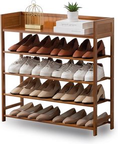 the shoe rack is holding many pairs of shoes