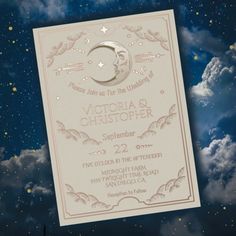 a wedding card with the moon and stars in the sky above it, on a background of clouds