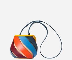 Multicolor Bucket Bag With Top Carry Handle, Multicolor Leather Bucket Bag With Detachable Strap, Luxury Multicolor Bucket Bag With Handles, Multicolor Leather-handled Bucket Bag, Multicolor On-the-go Bucket Bag With Adjustable Strap, Bucket Handbags, Leather Bucket, Patchwork Patterns, Sleek Look