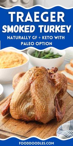 a roasted turkey on a wooden cutting board with other foods in the background and text overlay reading traeger smoked turkey naturally g & keto with pale option