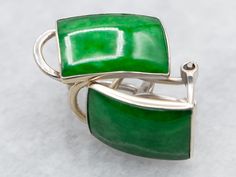 Add some elegance to your look with these stud earrings. Perfect for any occasion, the rectangular shape of the jadeite adds a touch of sophistication while the omega backs ensure a secure and comfortable fit. Upgrade your earring game with these luxurious studs. Metal: 18K White GoldGem: 2 JadeiteGem Measurements: 7.7 x 12.0 mm, Rectangle Modern Green Earrings With Polished Finish, Elegant Rectangular Clip-on Earrings For Formal Events, Green Rectangular Earrings For Formal Occasions, Elegant Green Rectangular Earrings, Classic Formal Earrings With Rectangular Stone, Formal Jade Earrings, Formal Rectangular Earrings In Fine Jewelry Style, Formal Fine Jewelry Earrings Rectangular, Formal Rectangular Jade Jewelry