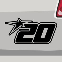 the number 20 on the back of a car with a star sticker in it