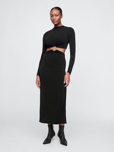 Soft, stretch maxi dress.  ​ Mockneck.  ​ Long sleeves.  ​ Cutout detail at waist with gold O-ring.  ​ Zipper at back.  ​ Fit: Slim.  A shift silhouette that's slim & straight through the body.  ​ Hits at the waist.  ​ Model is 5’9” and wearing a Gap Modern Goddess, Cutout Maxi Dress, Into Art, Cult Gaia, Toddler Gifts, O Ring, New Woman, Mock Neck, Turning