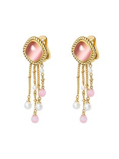 Indulge in timeless elegance with our luxurious Brielle Earrings, where the cat's eye stone takes center stage. Its delicate pink hue exudes a gentle versatility, effortlessly complementing any ensemble. Crafted with a twist sideways for a touch of refinement and retro charm, this piece elevates your outfit to new heights.  Adding a contemporary flair, the chain tassel design lends an undeniable sense of fashion-forward sophistication. Adorned with lustrous pearls and captivating cat's eye stones, each detail exudes opulence and meticulous craftsmanship. Elevate your look with these darling earrings, where richness and attention to detail converge in perfect harmony.   Features cat eye stones & pearls   20*55mm    Comes in a custom NJ box, perfect for storing or gifting Classic Pink Earrings For Formal Occasions, Elegant Gemstone Drop Clip-on Earrings, Rose Gold Clip-on Earrings, Pink Dangle Clip-on Jewelry, Pink Clip-on Dangle Jewelry, Elegant Rose Gold Dangle Clip-on Earrings, Classic Pink Drop Earrings, Feminine Evening Dangle Earrings, Feminine Dangle Earrings For Evening