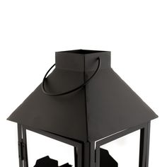 a black metal lantern on a white background